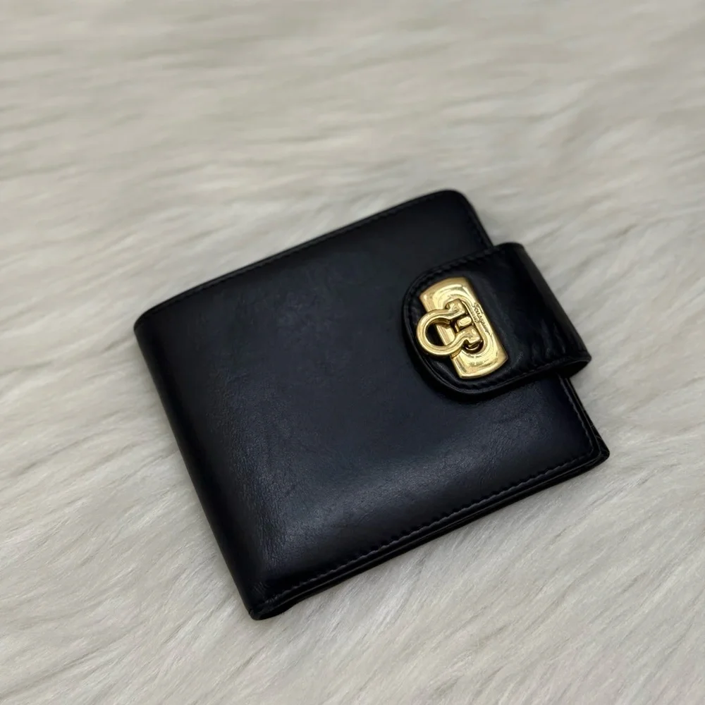 SALVATORE FERRAGAMO - BLACK LEATHER GOLD PLATED SECURE CLOSURE BIFOLD WALLET